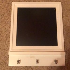 whiteboard with hangers